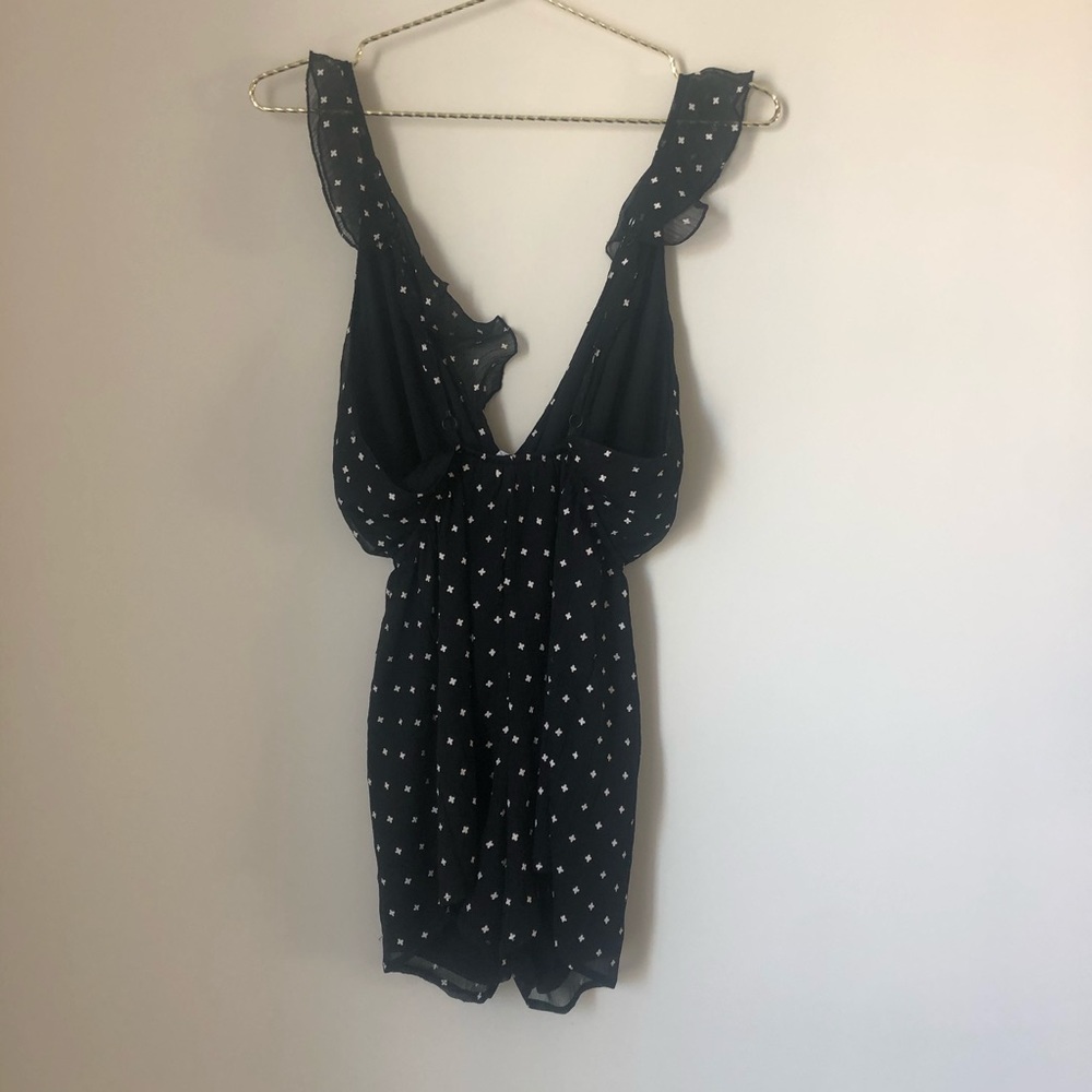 Revolve by the way. Aurora Ruffle Romper in Black - Picture 7 of 7